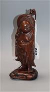 A Chinese boxwood figure of Budai standing on a sack, 19th century 22cm                                                                