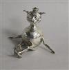 A George V novelty silver cigar lighter, modelled as a 'Lincoln Imp?', Henry Charles Freeman, Birmingham, 1910, 8cm.                   