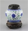 A rare Chinese doucai 'lotus flower' jar, Wanli six character mark and probably of the period, (1573-1619), H. 9.5cm, D. 10.8cm, later 