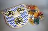 A large African beadwork necklace and three beadwork bags                                                                                                                                                                   