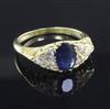 An 18ct gold, sapphire and diamond ring, size Q.                                                                                       