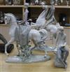 Three Lladro figures including horses and riders and a seated boy tallest 49cm                                                         