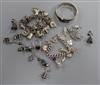 Two silver charm bracelets, a silver bangle, a silver and niello bracelet and earrings, marcasite earrings etc.                        