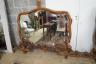 A near pair of Italian style carved walnut overmantel mirrors, decorated with winged figures, scrolls and scallop shells, larger width 200cm, height 152cm                                                                  