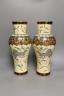 A large pair of Japonaise phoenix decorated baluster vases, 38 cms high.                                                                                                                                                    