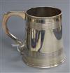 A George V silver mug with reeded bands, Elkington & Co, Birmingham, 1913, 11 oz.                                                      