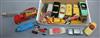 A collection of toy cars including Corgi Proteus Campbell Bluebird and a Corgi Major Chipperfield Circus International Truck           