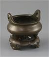 A Chinese bronze tripod censer and stand, Xuande mark but later Qing dynasty, censer 9.5cm diam.                                       