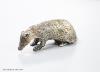 A modern free standing miniature model of a badger, with cabochon eyes, C.F.H & Co, London, 1992, length 10cm, 142 grams.                                                                                                   