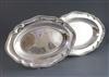 A near pair of George II/George III silver shaped oval meat dishes, 47 oz.                                                             