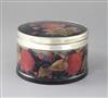 A Moorcroft pomegranate pattern circular trinket box, diameter 16.5cm                                                                  