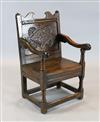 A mid 17th century jointed oak Wainscot elbow chair, W.1ft 9.5in. H.3ft.                                                               