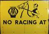 An A.A. enamelled road sign 'No Racing at ...', 30 x 42in.                                                                             