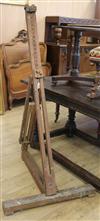 An Edwardian oak and pine easel Height 162cm                                                                                           