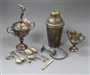 Two silver trophy cups, five silver teaspoons, a silver frame mount, a silver Celtic style brooch and four other items.                