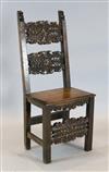 A 17th century Spanish carved walnut side chair, W. 1ft. 7.5in. H. 3ft 5.5in.                                                          