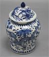 A 19th century Chinese blue and white vase and cover, decorated with dragons height 20cm                                               