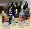 Thirty three assorted bottle of spirits, ports, sherries, liqueurs etc. including Blandy's Madeira and Smirnoff vodka.                 