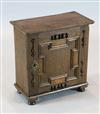 A Charles II oak spice cupboard, W. 1ft 5in. D. 9.5in. H. 1ft 7in.                                                                     