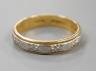 A modern 18ct two colour gold band, size L                                                                                                                                                                                  