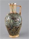 Arthur Barlow for Doulton Lambeth, an early ewer of scrolling leaf design, dated 1873, 28.5cm                                          