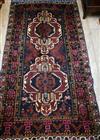 A Caucasian dark red ground rug 205 x 115cm                                                                                            