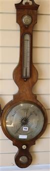 Burton of Lewisham. A Regency inlaid mahogany wheel barometer W.31cm                                                                   