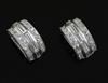 A pair of platinum?, baguette and round cut diamond set demi-lune ear clips, 15mm.                                                     