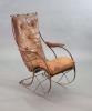 After R.W Winfield & Co, Birmingham, a mid 19th century rocking chair, 59cm wide, 83cm deep, 105cm high.                                                                                                                    