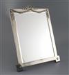 An Edwardian silver rectanglar easel mirror, London, 1904, with swag and ribbon surmount,                                              