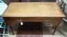 An Edwardian satinwood banded mahogany writing table, width 115cm, depth 53cm, height 72cm                                                                                                                                  