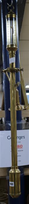 A brass marine barometer                                                                                                               