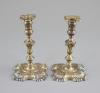 A pair of George II cast silver tapersticks, by Richard Gurney & Co                                                                                                                                                         