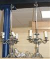 A pair of three branch putti table lamps height 71cm                                                                                   