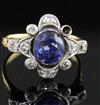 An early-mid 20th century 18k gold, sapphire and diamond cluster ring, size L.                                                         