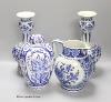 A pair of Dutch Delft blue and white vases, 29cm, a similar ovoid jar and cover and a bulbous jug                                                                                                                           