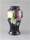 A Moorcroft wisteria baluster vase, height 24cm                                                                                        