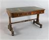 An early Victorian rosewood writing table, W.4ft D.2ft 3in. H.2ft 6in.                                                                 