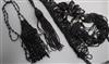 Four assorted French jet long necklaces and a bracelet.                                                                                