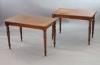 A pair of late Victorian mahogany writing tables, W.112cm D.68cm H.77.5cm                                                                                                                                                   