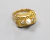 A 14ct gold, pearl and diamond-set tablet ring                                                                                                                                                                              