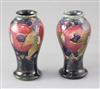 Two Moorcroft miniature pomegranate pattern baluster vases, height 10cm                                                                