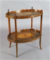 An Edwardian marquetry inlaid satinwood two tier oval occasional table, W.2ft 4in. D.1ft 8in. H.2ft 7in.                               