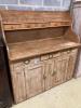 A Victorian pine dresser (lacks rack), length 138cm, depth 52cm, height 152cm                                                                                                                                               