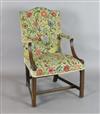 A George III mahogany Gainsborough chair, W.1ft 11in. H.3ft 2in.                                                                       