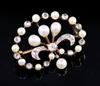 An Edwardian pearl and diamond set demi-lune drop openwork brooch, 27mm.                                                               