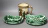 A Doulton Oliver Twist mug and eight Portuguese leaf dishes                                                                                                                                                                 