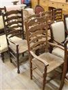 A set of five ash ladderback, rush seated dining chairs                                                                                