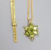 An Italian 9ct gold necklace and a 9ct gold and peridot-set necklace                                                                                                                                                        