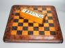 A late 19th century walnut, ebony and sycamore chessboard together with a box set of dominoes, chessboard 41cm x41cm                                                                                                        